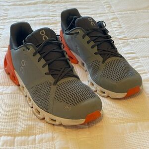 On Running Charcoal and Tangerine Athletic Shoes